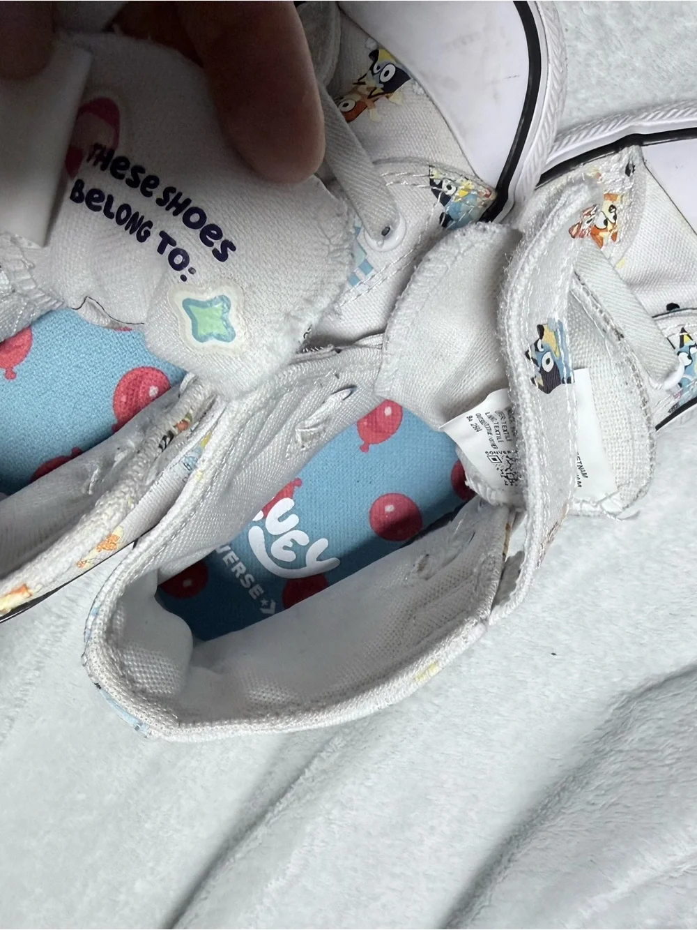 Converse White High Top Sneakers with Blue Cartoon Insole